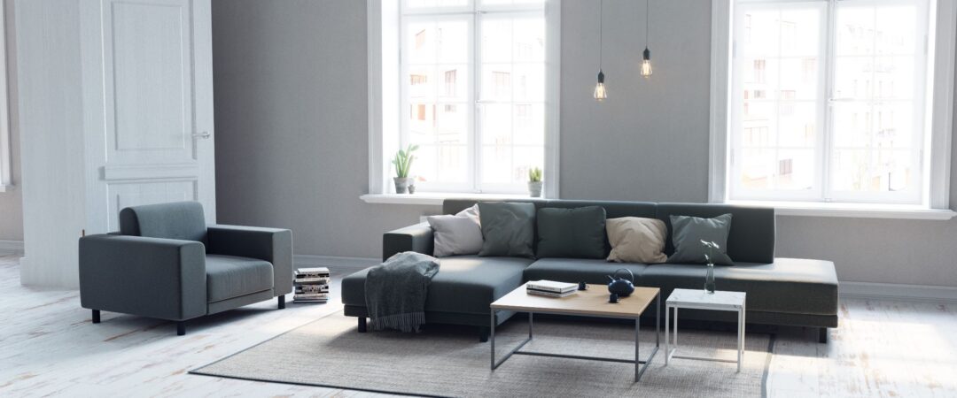 Un salon qui applique les principes de la décoration moderne avec des lignes épurées et beaucoup d'espace.