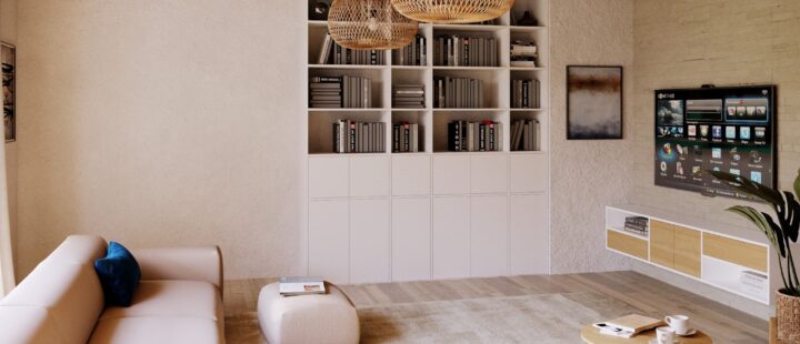 gemuetliches Wohnzimmer mit Sofas Bücherwand und Sideboard